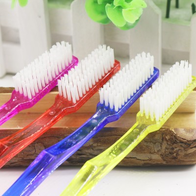 Adult hot-selling colorful transparent crystal cheap toothbrush with hard nylon bristle for home use